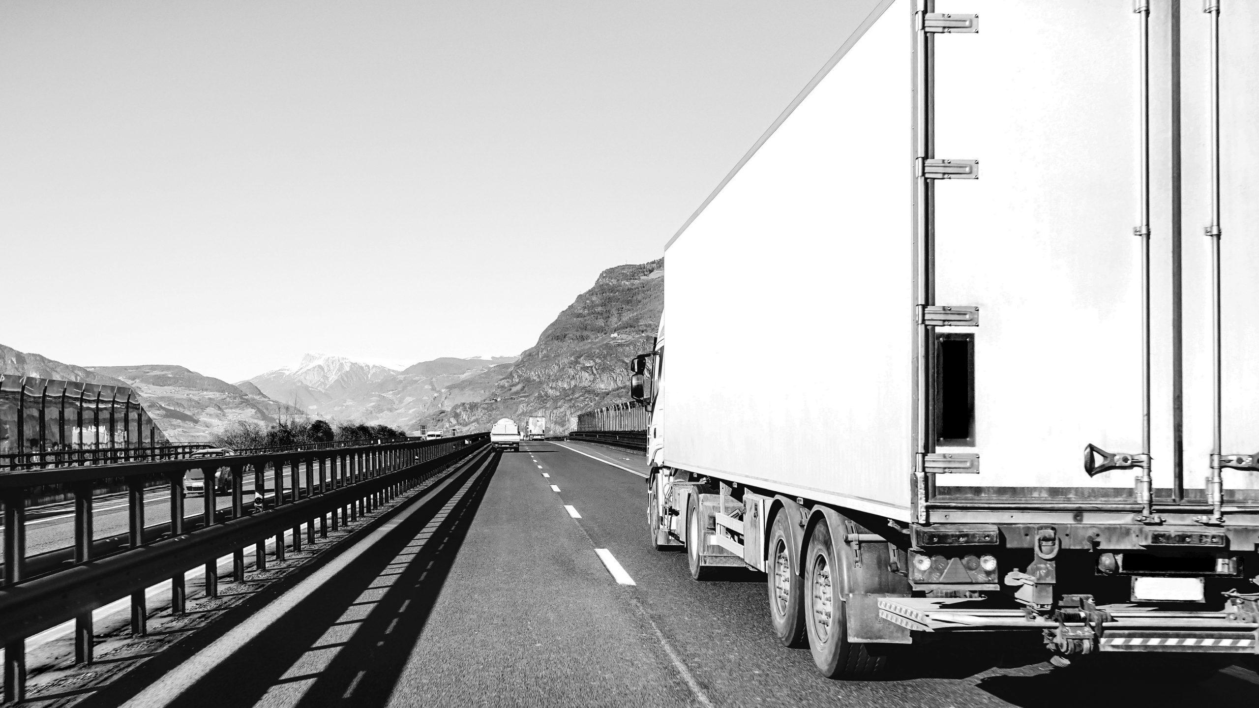 Semi truck speeding on empty highway line - Transport logistic c